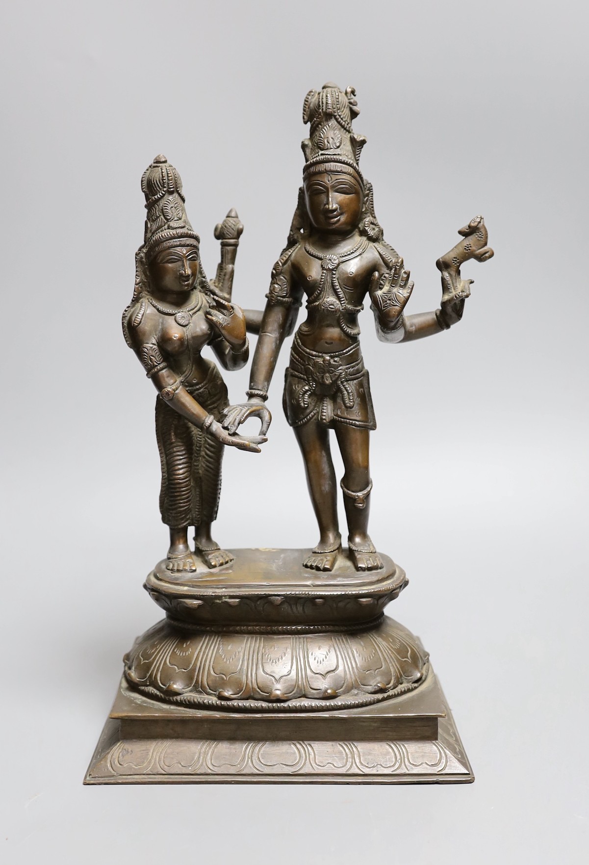 An Indian bronze group Shiva and Pavarti, early 20th century, 33cms high